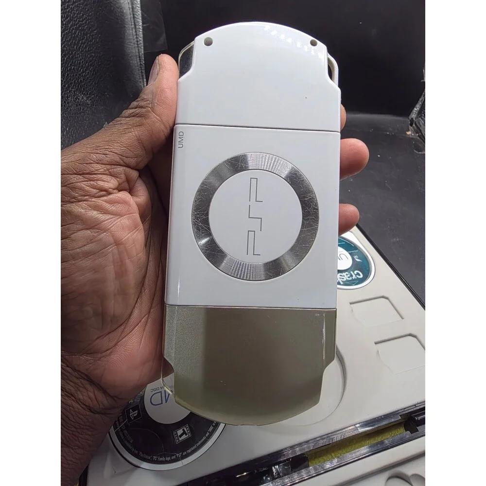 Sony PSP-2001 White Bundle – New Battery, 4 Games, Crash UMD Movie
